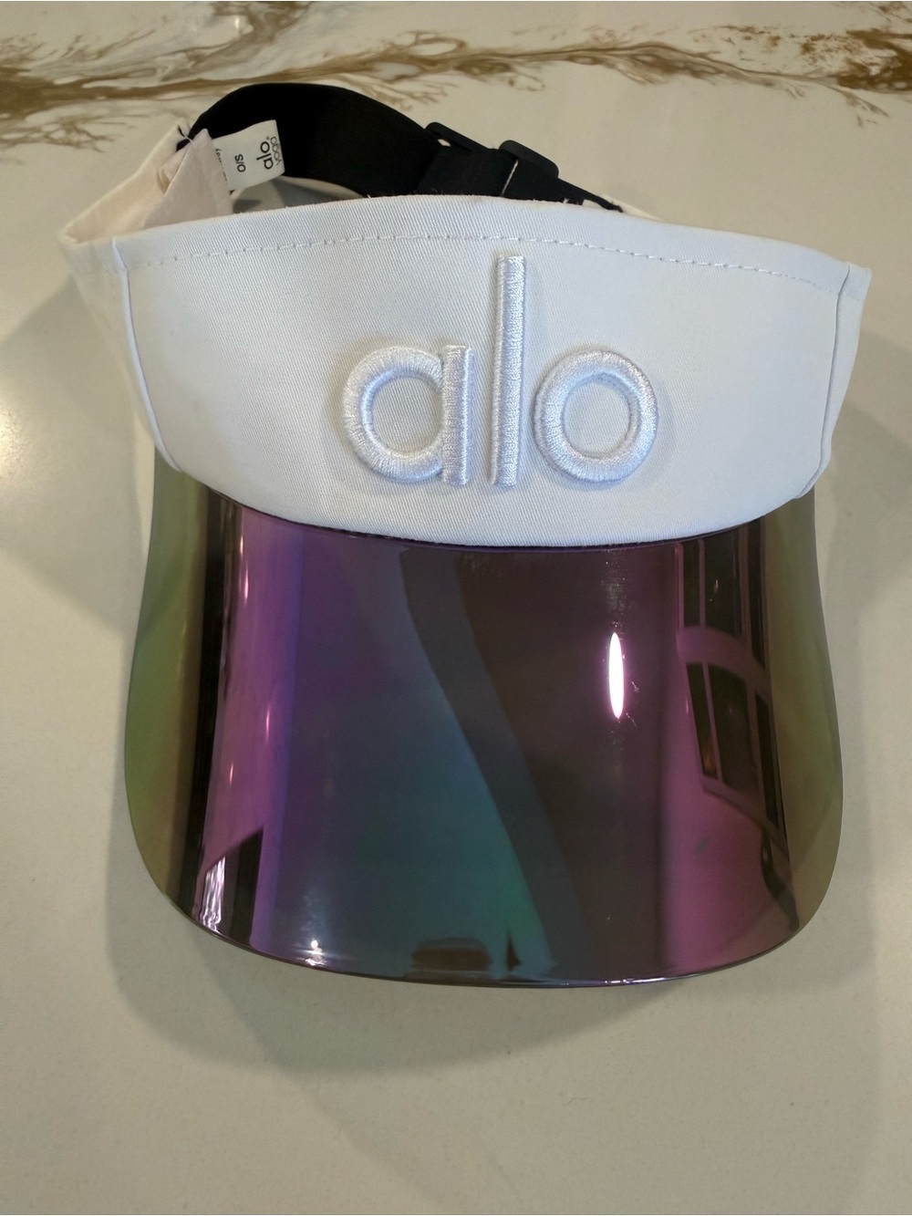 ALO Yoga White Visor with Iridescent Purple-Green Shield